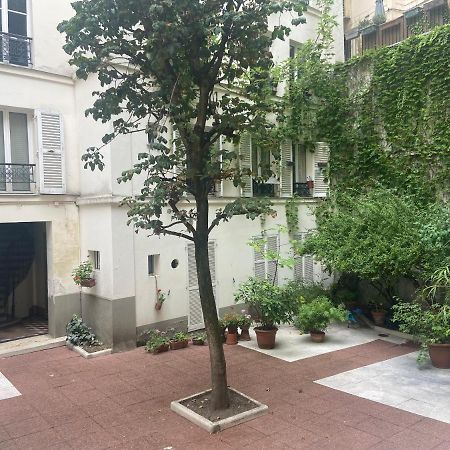 Tres Bel Appartement Montmartre París Exterior foto